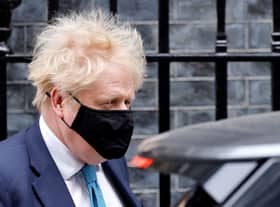 Prime Minister Boris Johnson leaves from 10 Downing Street on January 26, 2022, to take part in the weekly session of Prime Minister Questions (PMQs) at the House of Commons (Photo by TOLGA AKMEN/AFP via Getty Images)