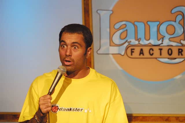 Joe Rogan performing at a September 11 comedy benefit in 2001 (Photo: Jason Kirk/Getty Images)