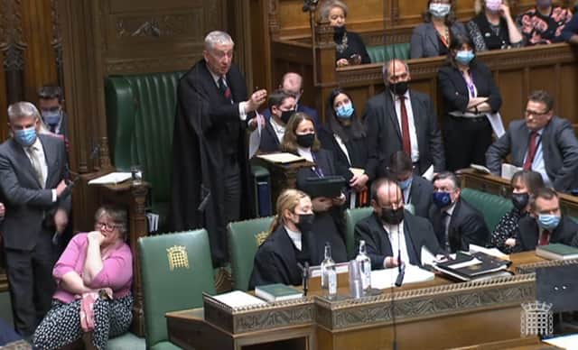 <p>MPs are often seen standing up and sitting back down during PMQs - but why do they do it? (Credit: PA) </p>