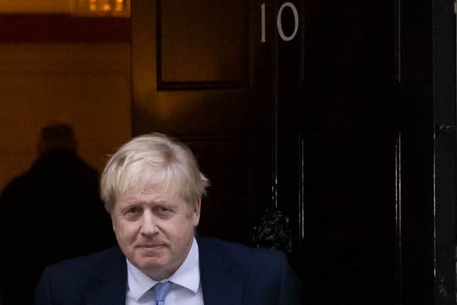 Prime Minister Boris Johnson leaves 10 Downing Street to make a statement at Parliament.  (Photo by Dan Kitwood/Getty Images)