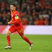 Aaron Ramsey of Wales runs with the ball during the 2022 FIFA World Cup Qualifier match between Wales and Belgium at Cardiff City Stadium on November 16, 2021 in Cardiff, Wales