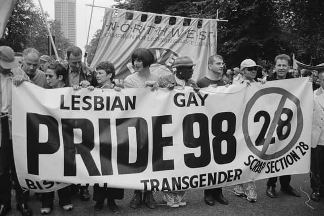 Protesters holding a banner opposing Section 28, at the Lesbian, Gay, Bisexual, and Transgender Pride event, London, 4 July 1998 - it wouldn’t be repealed until 2003 (Photo: Steve Eason/Hulton Archive/Getty Images)
