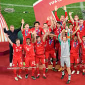 Manuel Neuer of FC Bayern Muenchen lifts the FIFA Club World Cup Qatar 2020 trophy after the finale FIFA Club World Cup Qatar 2020 match between FC Bayern Muenchen and Tigres UANL on February 11, 2021 in Doha, Qatar