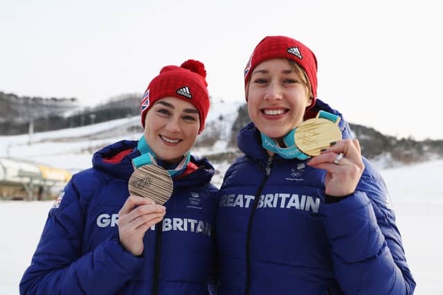 Deas, left, and Yarnold with their medals in Korea