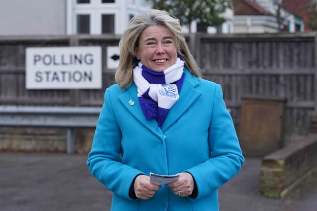 Conservative candidate Anna Firth leaves Highlands Methodist Church Hall after casting her vote in the Southend West by-election (image: PA)