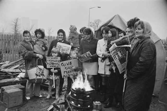 The wives and children of British miners on a picket line outside one of the two power stations at Rugeley in Staffordshire