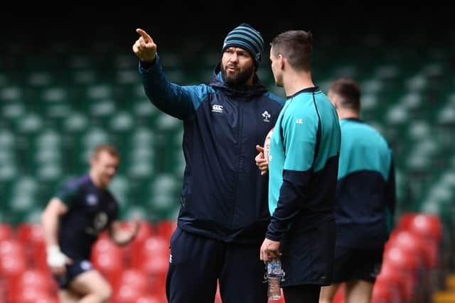 Ireland player Jonny Sexton (r) chats with coach Andy Farrell during training ahead of the Guinness Six Nations match against Wales at  Millennium Stadium on March 15, 2019