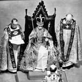 File photo dated 02/06/53 after the coronation in Westminster Abbey, London showing Queen Elizabeth II wearing the St. Edward Crown and carrying the Sceptre and the Rod (Photo: PA)