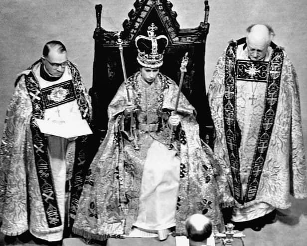 File photo dated 02/06/53 after the coronation in Westminster Abbey, London showing Queen Elizabeth II wearing the St. Edward Crown and carrying the Sceptre and the Rod (Photo: PA)