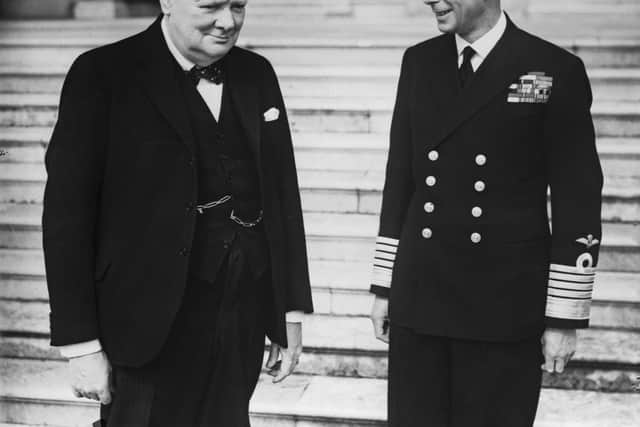 British Prime Minister Winston Churchill (1874 - 1965) with King George VI (right) in the grounds of Buckingham Palace, London, during World War II, circa 1942 (Photo: Fox Photos/Hulton Archive/Getty Images)