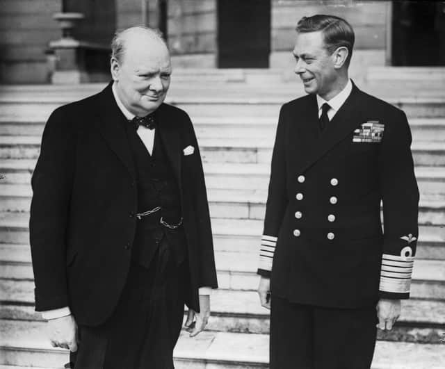 British Prime Minister Winston Churchill (1874 - 1965) with King George VI (right) in the grounds of Buckingham Palace, London, during World War II, circa 1942 (Photo: Fox Photos/Hulton Archive/Getty Images)