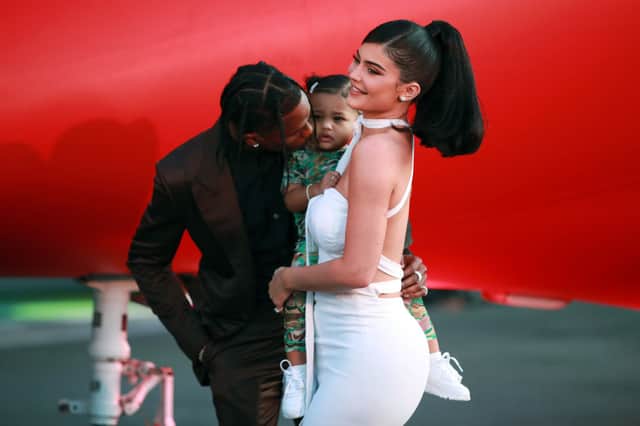 <p>Travis Scott, Stormi Webster, and Kylie Jenner attend the premiere of Netflix’s Travis Scott: Look Mom I Can Fly (Photo: Rich Fury/Getty Images)</p>