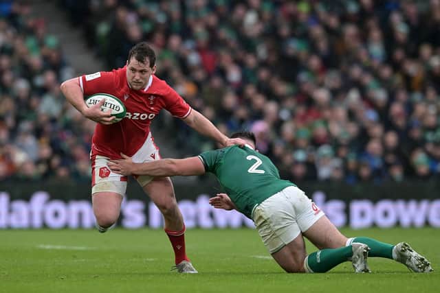 Taine Basham of Wales is tackled by Ronan Kelleher of Ireland during the Guinness Six Nations match between Ireland and Wales at Aviva Stadium on February 05, 2022 in Dublin, Ireland