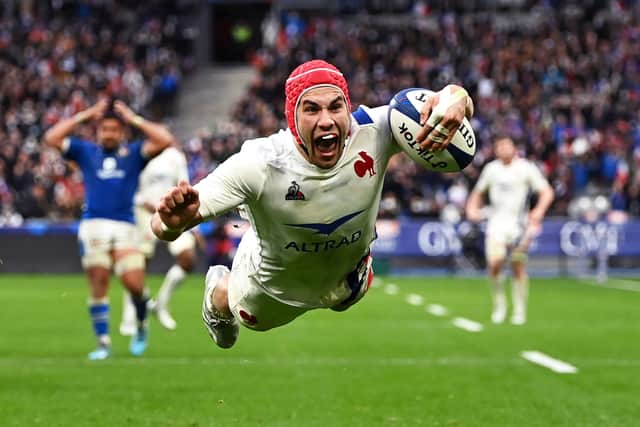 Gabin Villiere of France dives over to score his second and the third France try during the Guinness Six Nations match between France and Italy at Stade de France on February 06, 2022 in Paris, France