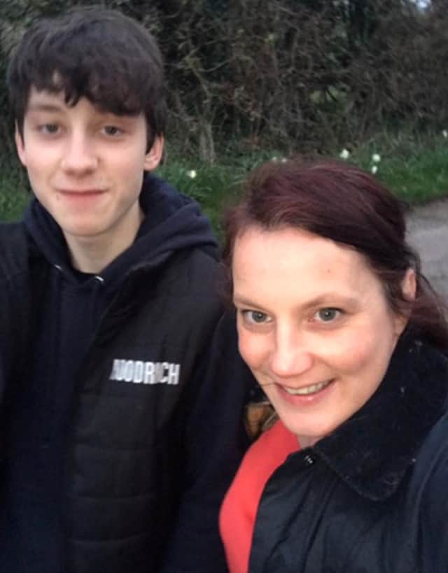 Josh Hall with his mother Kirsty Hall. (Credit: SWNS)