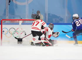 Alex Carpenter #25 of Team United States scores on a power-play in the second period during the Group A Women's Preliminary Round ice hockey match between Team United States and Team Canada at Wukesong Sports Centre on February 08, 2022 in Beijing, China