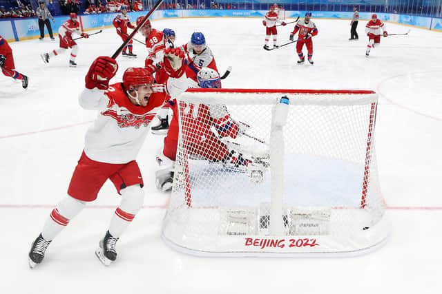 Defender Mikkel Aagaard #42 of Team Denmark celebrates his team goal against Team Czech Republic in the first period during the Men's Preliminary Round Group B match on Day 5 of the Beijing 2022 Winter Olympic Games at National Indoor Stadium on February 09, 2022 in Beijing, China