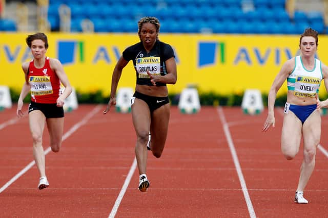 Douglas, centre, will compete at a Beijing Olympics for the second time