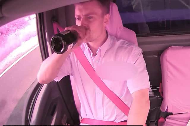 Mason Cowgill was captured drinking from a bottle of champagne while driving his work’s van.