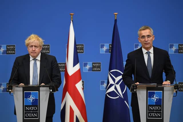 Boris Johnson spoke alongside Nato secretary-general Jens Stoltenberg in Brussels today (Photo: PA)