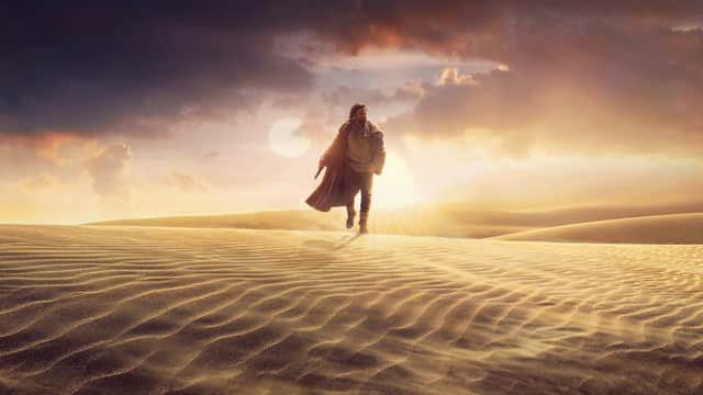 Obi Wan Kenobi walks across what are presumable the desert dunes of Tatooine in Star Wars spin-off series, Kenobi (Image: Disney)