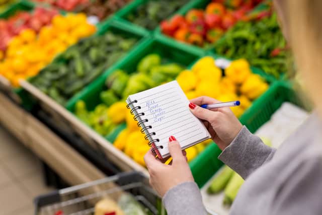 Making a shopping list can not only save you time, but it can also save you money (image: Adobe)