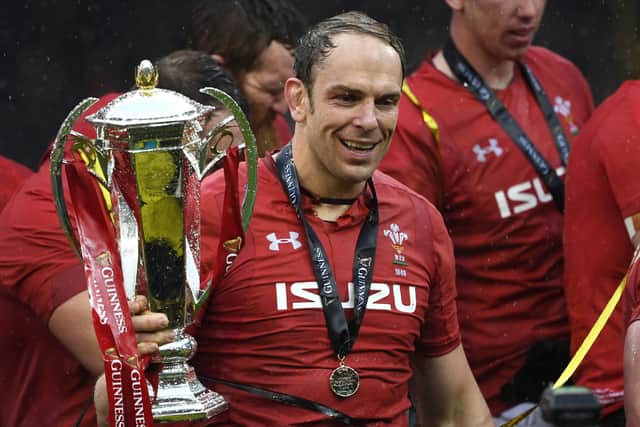 Wales' lock Alun Wyn Jones celebrates with the trophy after being crowned Six Nations rugby champions after beating Ireland at the Principality Stadium in Cardiff, south Wales, on March 16, 2019