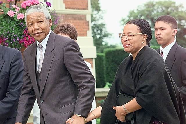 Nelson Mandela and Graca Machel on a four-day visit to the United Kingdom (Photo: JOHNNY EGGITT/AFP via Getty Images)