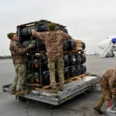 Ukrainian servicemen receiving a delivery this week of FGM-148 Javelins, a man-portable anti-tank missile provided by US as part of a military support amid the growing crisis.