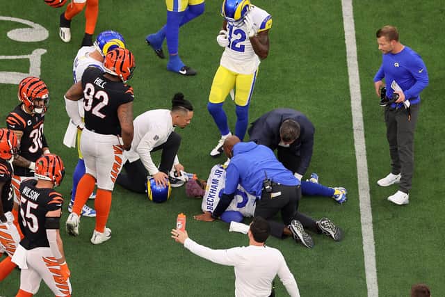 Odell Beckham Jr. #3 of the Los Angeles Rams lies on the ground after an injury in the second quarter against the Cincinnati Bengals during Super Bowl LVI at SoFi Stadium.