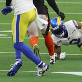 Odell Beckham Jr. #3 of the Los Angeles Rams lies on the ground following an injury during the first half of Super Bowl LVI against the Cincinnati Bengals at SoFi Stadium.