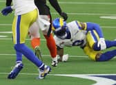 Odell Beckham Jr. #3 of the Los Angeles Rams lies on the ground following an injury during the first half of Super Bowl LVI against the Cincinnati Bengals at SoFi Stadium.