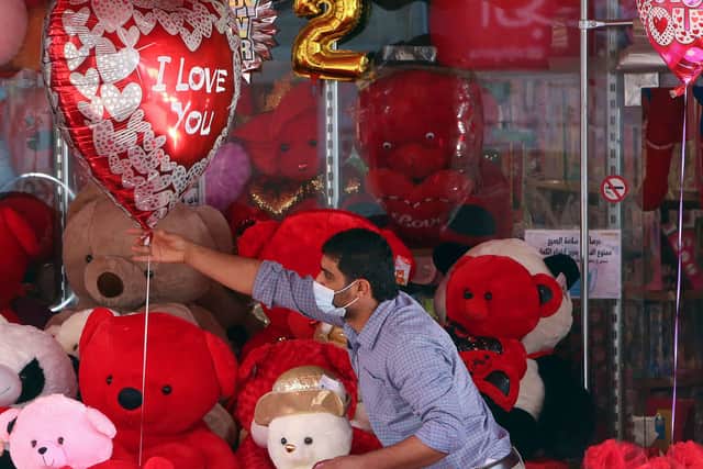 If in doubt, you can’t go wrong with a romantic poem (Photo: YASSER AL-ZAYYAT/AFP via Getty Images)