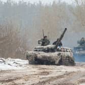 Ukrainian Military Forces servicemen of the 92nd mechanized brigade use tanks, self-propelled guns and other armored vehicles to conduct live-fire exercises near the town of Chuguev, in the Kharkiv region (AFP via Getty Images)