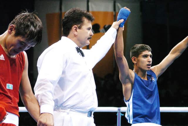 Khan won the Olympic Silver medal in 2004