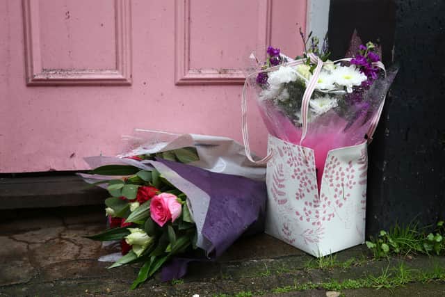 Flower tributes were laid outside the home of Caroline Flack following her death (Photo: Hollie Adams/Getty Images)