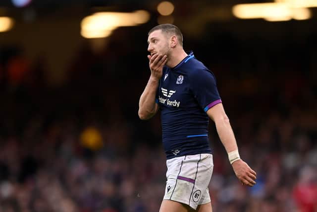 Finn Russell of Scotland leaves the field after he receives a yellow card for a knock on during the Guinness Six Nations match between Wales and Scotland at Principality Stadium on February 12, 2022 in Cardiff, Wales