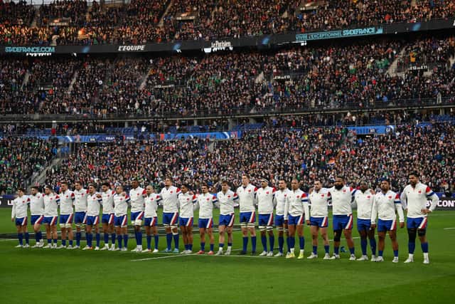 The France squad stand for their national anthem during the Guinness Six Nations match between France and Ireland at Stade de France on February 12, 2022 in Paris, France