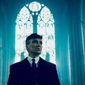 Cillian Murphy as Tommy Shelby, stood in a cathedral (Credit: BBC/Caryn Mandabach Productions Ltd./Robert Viglasky)