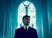 Cillian Murphy as Tommy Shelby, stood in a cathedral (Credit: BBC/Caryn Mandabach Productions Ltd./Robert Viglasky)