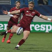 Munster's British-born Irish full-back Mike Haley kicks the ball during the European Champions Cup Round 3 Pool B rugby union match between Castres Olympique and Munster at Stade Pierre Fabre, in Castres, southwestern France, on January 14, 2022