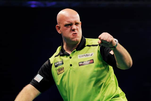 Michael van Gerwen of The Netherlands celebrates in his Semi-Final match against Jonny Clayton of Wales during Night 17 of the Unibet Premier League Darts at Marshall Arena on May 28, 2021 in Milton Keynes, England