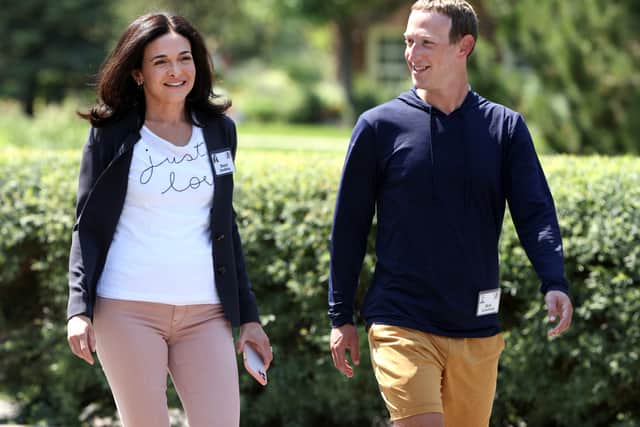 CEO of Facebook Mark Zuckerberg walks with COO of Facebook Sheryl Sandberg (image: Kevin Dietsch/Getty Images)