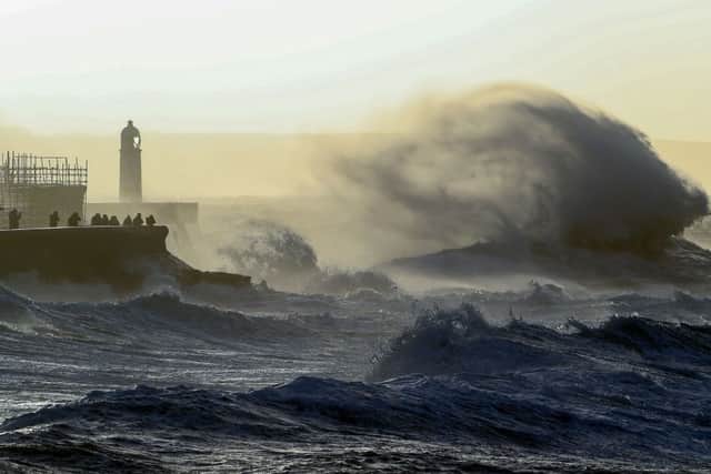 Waves crash against the sea wall at Porthcawl, south Wales, as Storm Eunice brings high winds across the country (Photo: GEOFF CADDICK/AFP via Getty Images)