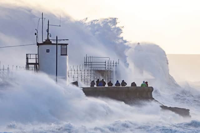 Waves crash against the harbour wall during Storm Eunice (Photo: Matthew Horwood/Getty Images)
