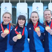 (L-R) Curlers Milli Smith, Hailey Duff, Jennifer Dodds, Vicky Wright and Eve Muirhead of Team Great Britain pose for pictures with their gold medals after winning the  Women's Curling final against Team Japan  at National Aquatics Centre on February 20, 2022 in Beijing, China