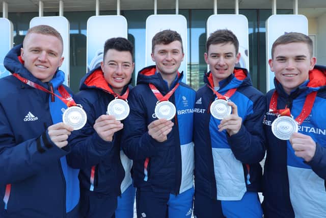 Silver medalists for Men’s Curling Bobby Lammie, Hammy McMillan, Grant Hardie and Ross Whyte of Team Great Britain pose for pictures at National Aquatics Centre on February 20, 2022 in Beijing, China