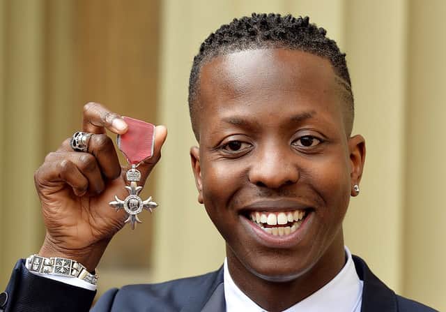 Edwards holds his Member of the Order of the British Empire (MBE) medal after it was awarded to him by Prince Charles at Buckingham Palace in 2015 (Photo: JOHN STILLWELL/AFP via Getty Images)