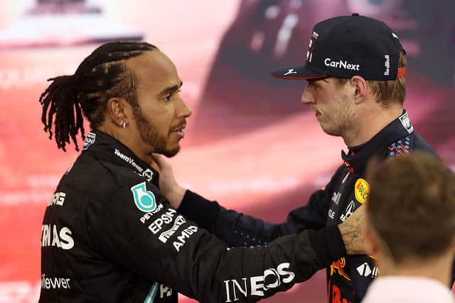 Hamilton, left, congratulates Verstappen on 2021 Championship