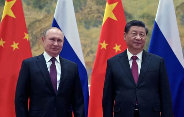 Vladimir Putin (L) with Chinese President Xi Jinping during their meeting in Beijing on 4 February 2022 (Photo: ALEXEI DRUZHININ/Sputnik/AFP via Getty Images)